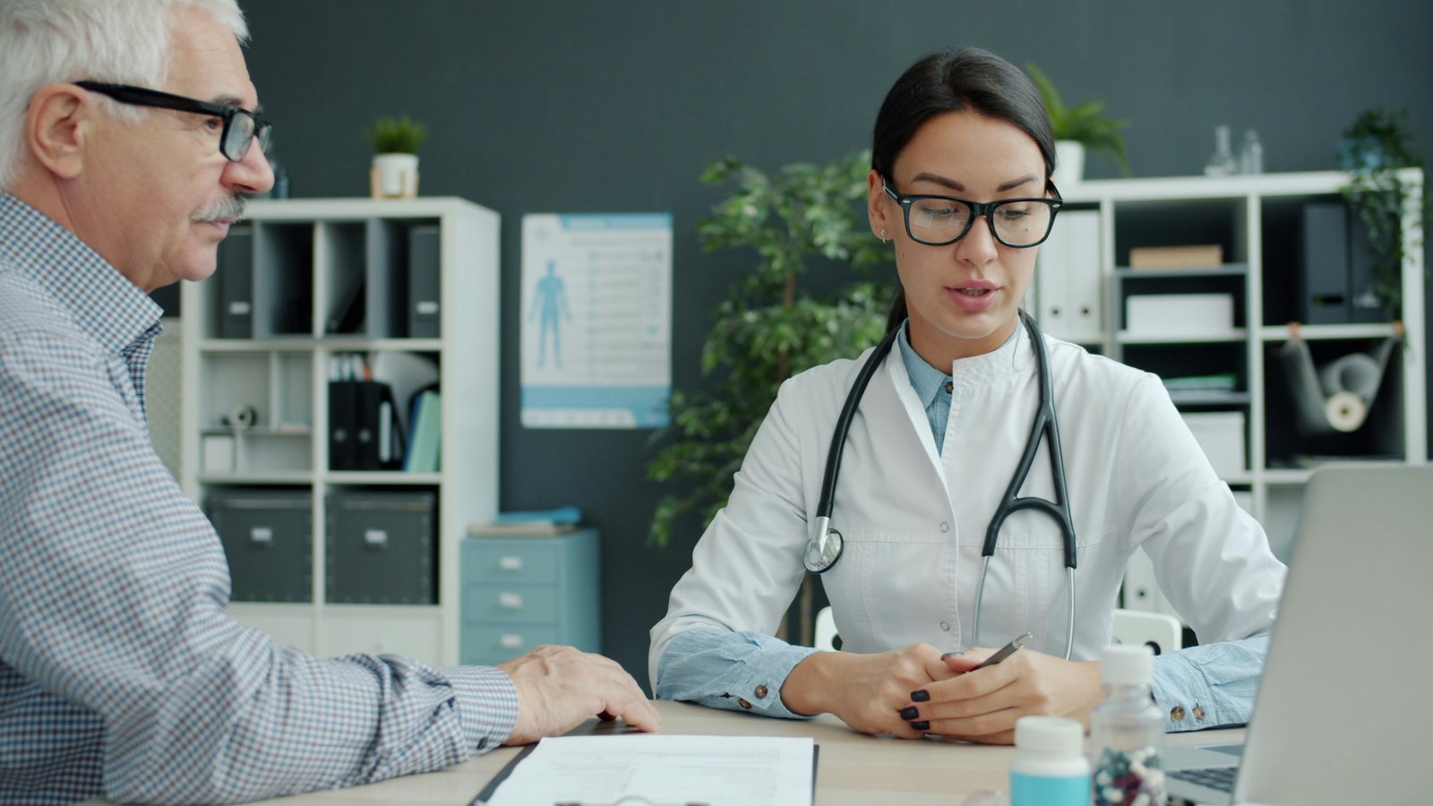 Physician reviewing a patient's care plan